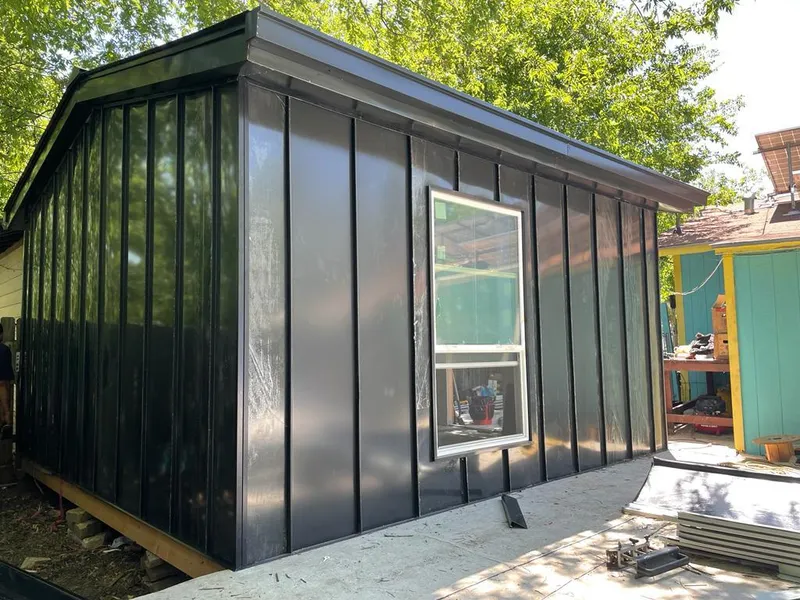 Black standing seam metal wall panels for Metal Roof Installation in East Bradford