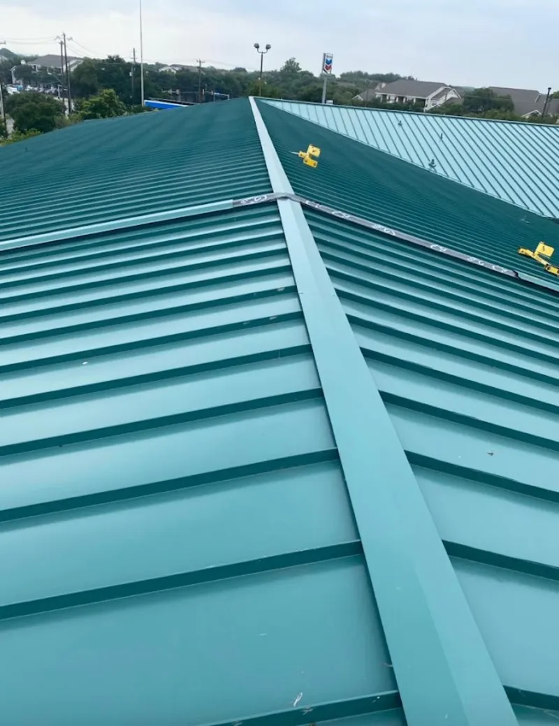 Green commercial metal roof ridge and valley for Metal Roof Repair in East Bradford